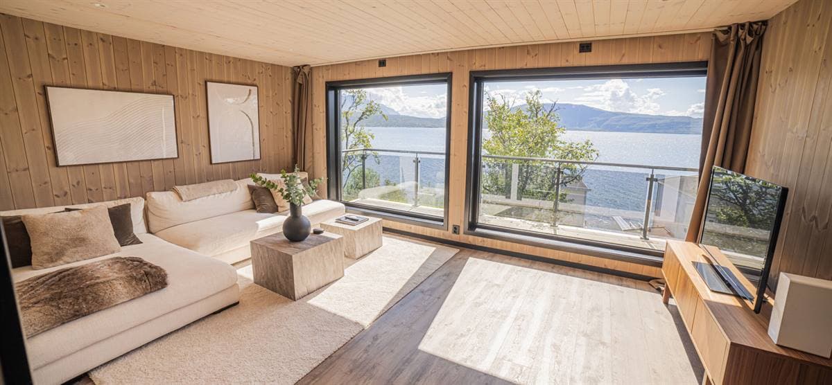 Living room with white sofa and panoramic windows