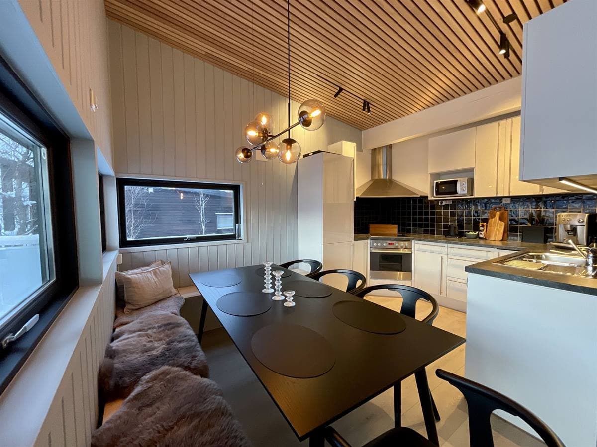 Kitchen with dining table and bench