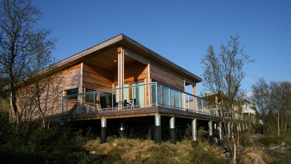 Modern wooden Sea View Premium Cabin with a glass balcony