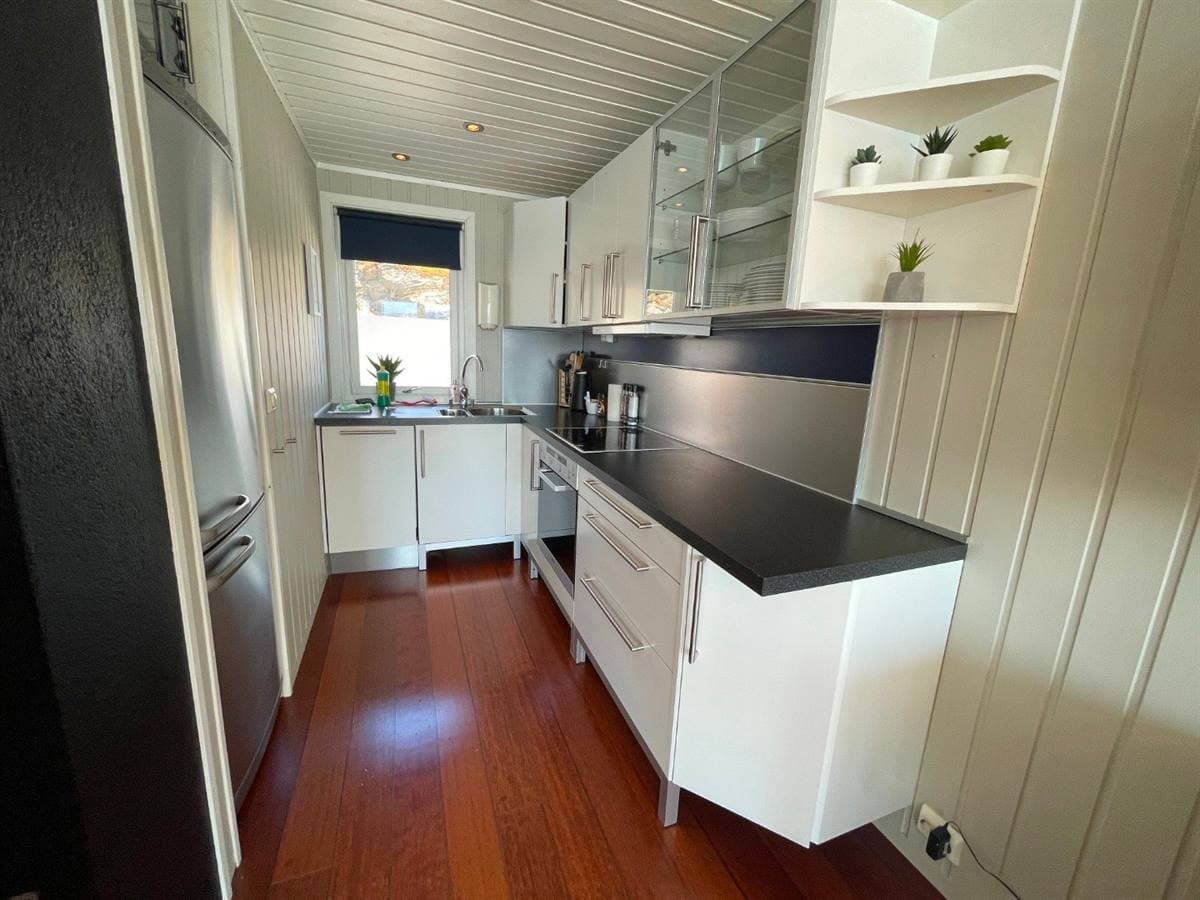 Galley kitchen in a waterfront cabin